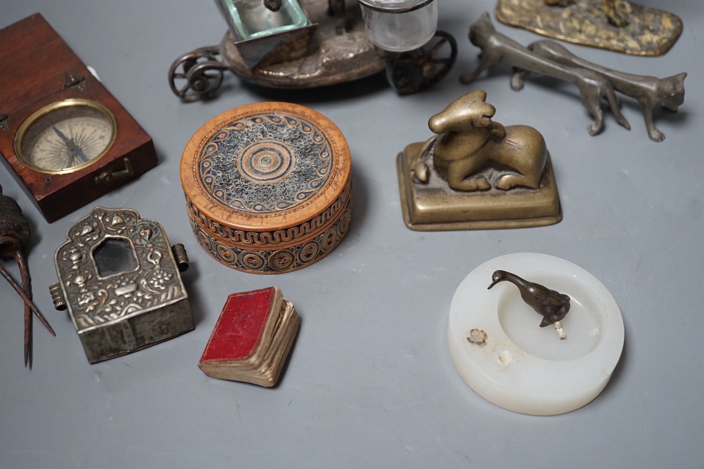 A selection of various miscellaneous items, to include a pair of 19th century cock fighting spurs, a rolled paperwork circular box and cover, a novelty plated donkey cruet, Tibetan box etc.